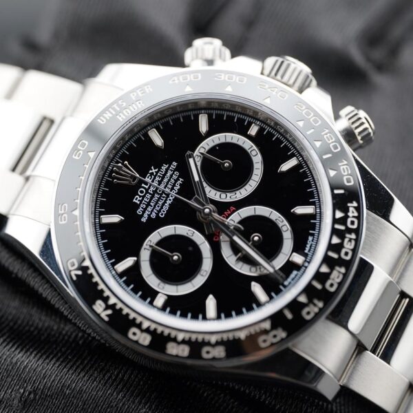 Rolex Daytona Cosmograph 40mm Black Dial Black Ceramic Bezel box and papers